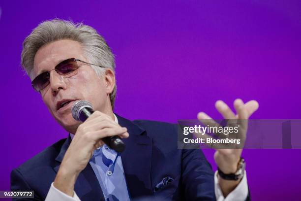 Bill McDermott, chief executive officer of SAP SE, gestures while speaking during the Viva Technology conference in Paris, France, on Thursday, May...