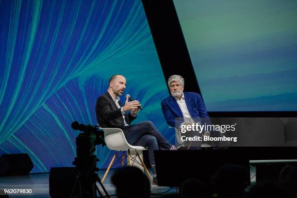 Dara Khosrowshahi, chief executive officer of Uber Technologies Inc., left, speaks beside Maurice Levy, chairman of Publicis Group SA, during the...
