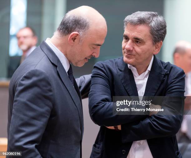 Economic and Financial Affairs, Taxation and Customs Commissioner Pierre Moscovici is talking with the Greek Finance Minister Euclid Tsakalotos prior...