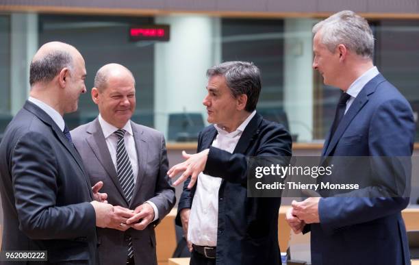 Economic and Financial Affairs, Taxation and Customs Commissioner Pierre Moscovici is talking with the German Federal Minister of Finance Olaf...