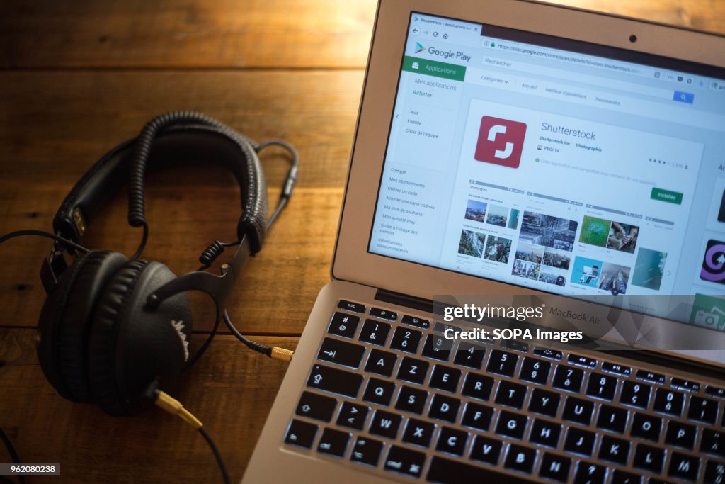 The Shutterstock application seen displayed on a Apple...