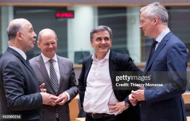 Economic and Financial Affairs, Taxation and Customs Commissioner Pierre Moscovici is talking with the German Federal Minister of Finance Olaf...