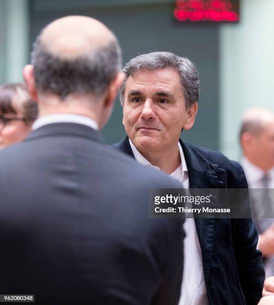 Economic and Financial Affairs, Taxation and Customs Commissioner Pierre Moscovici is talking with the Greek Finance Minister Euclid Tsakalotos prior...