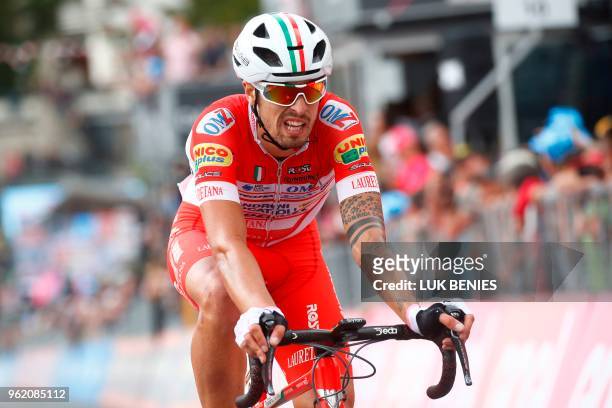 Italy's rider of team Androni Giocattoli Sidermec Mattia Cattaneo, 3rd, crosses the finish line of the 18th stage between Abbiategrasso and Prato...