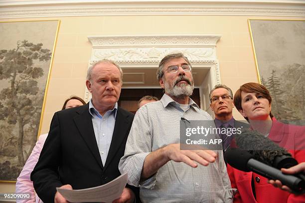 Northern Ireland's deputy First Minister Martin McGuinness and Sinn Fein President Gerry Adams speak during a press conference at Hillsborough Castle...