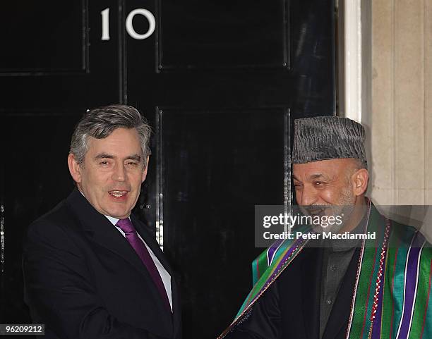 Prime Minister Gordon Brown welcomes Afghan President Hamid Karzai to 10 Downing Street on January 27, 2010 in London, England. The Afghanistan...