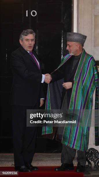 Prime Minister Gordon Brown welcomes Afghan President Hamid Karzai to 10 Downing Street on January 27, 2010 in London, England. The Afghanistan...
