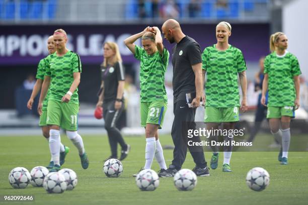 Lara Dickenmann, Alexandra Popp and Nilla Fischer of Vfl Wolfsburg warm up ahead of the UEFA Womens Champions League Final between VfL Wolfsburg and...