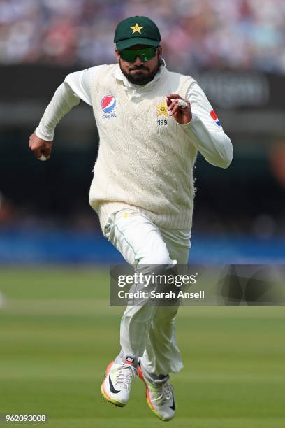 Azhar Ali of Pakistan pursues the ball in an unsuccessful attempt to prevent a boundary on day 1 of the First NatWest Test match between England and...