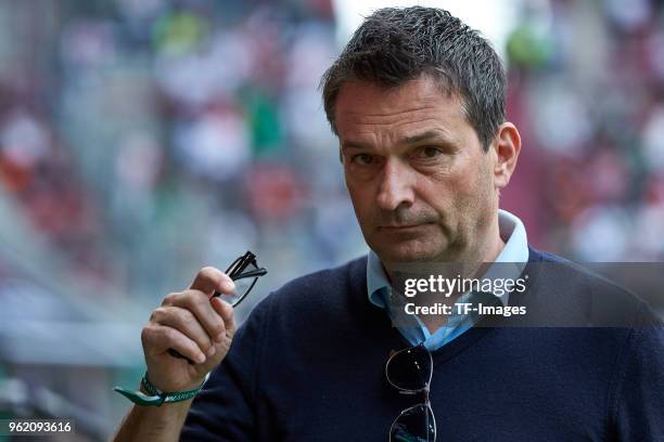 Sporting director Christian Heidel of Schalke looks on prior to the Bundesliga match between FC Augsburg and FC Schalke 04 at WWK-Arena on May 5,...