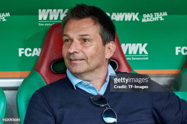 Sporting director Christian Heidel of Schalke looks on prior to the Bundesliga match between FC Augsburg and FC Schalke 04 at WWK-Arena on May 5,...