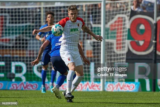 Jeffrey Gouweleeuw of Augsburg controls the ball during the Bundesliga match between FC Augsburg and FC Schalke 04 at WWK-Arena on May 5, 2018 in...