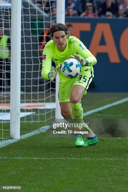 Goalkeeper Marvin Hitz of Augsburg controls the ball during the Bundesliga match between FC Augsburg and FC Schalke 04 at WWK-Arena on May 5, 2018 in...