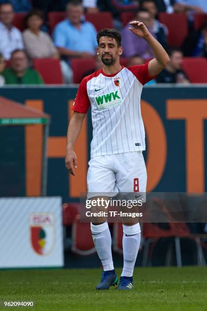 Rani Khedira of Augsburg gestures during the Bundesliga match between FC Augsburg and FC Schalke 04 at WWK-Arena on May 5, 2018 in Augsburg, Germany.