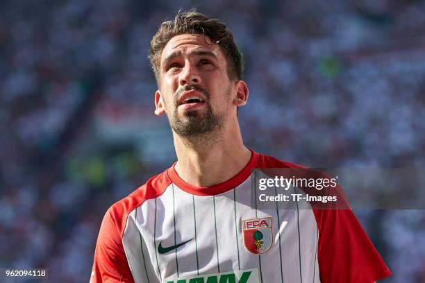 Rani Khedira of Augsburg looks on during the Bundesliga match between FC Augsburg and FC Schalke 04 at WWK-Arena on May 5, 2018 in Augsburg, Germany.