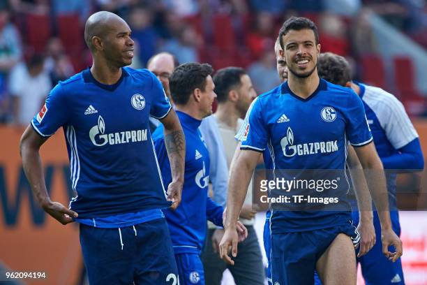 Naldo of Schalke and Franco Di Santo of Schalke laugh after the Bundesliga match between FC Augsburg and FC Schalke 04 at WWK-Arena on May 5, 2018 in...