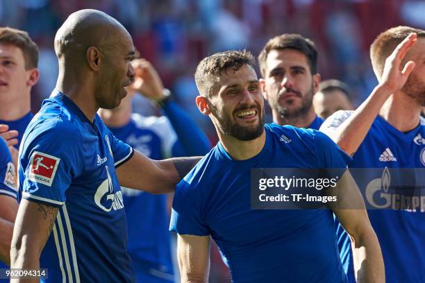 Naldo of Schalke and Daniel Caligiuri of Schalke celebrate after winning the Bundesliga match between FC Augsburg and FC Schalke 04 at WWK-Arena on...