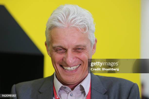 Oleg Tinkoff, founder of TCS Group Holding Plc, reacts during the St Petersburg International Economic Forum in Saint Petersburg, Russia, on...