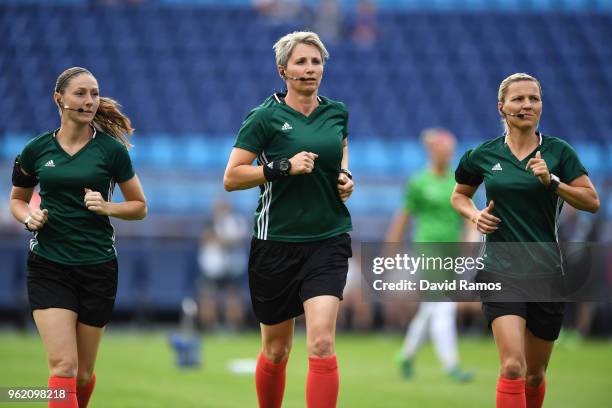 Referees Jana Adámková; Sian Massey and Sanja Rodak Karic warm up ahead of the UEFA Womens Champions League Final between VfL Wolfsburg and...