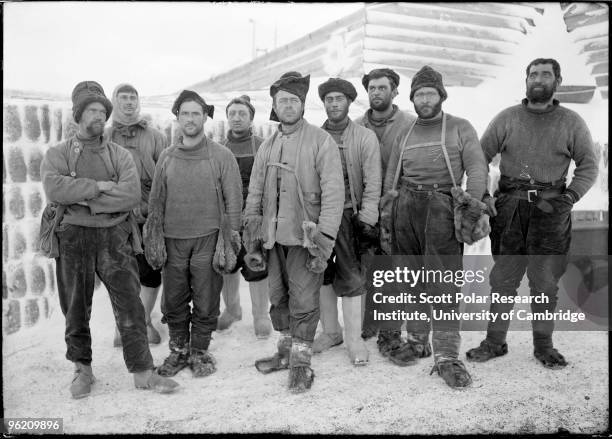 Captain Robert Falcon Scott and eight other expedition members at camp in the Ross Dependency of Antarctica, during Scott's Terra Nova Expedition to...