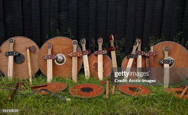 viking wood swords and sheilds - hafnarfjordur stock pictures, royalty-free photos & images