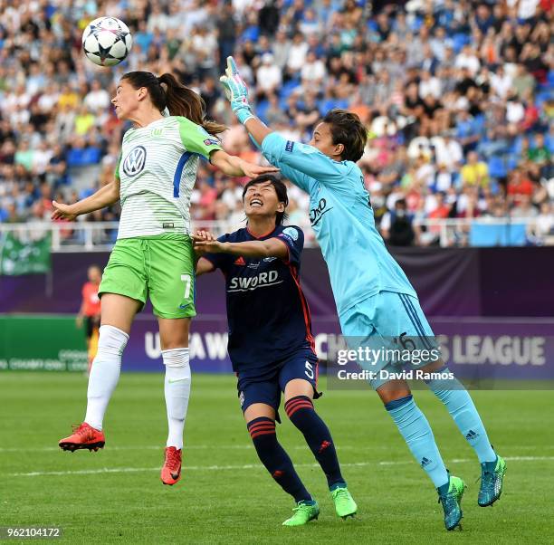 Sara Björk Gunnarsdottir of Vfl Wolfsburg, Saki Kumagai and Sarah Bouhaddi of Lyon compete for the ball during the UEFA Womens Champions League Final...