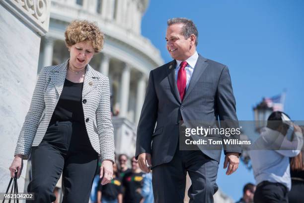 Reps. Susan Brooks, R-Ind., and David Cicilline, D-R.I., leave the Capitol after the last votes in the House before the Memorial Day recess on May...
