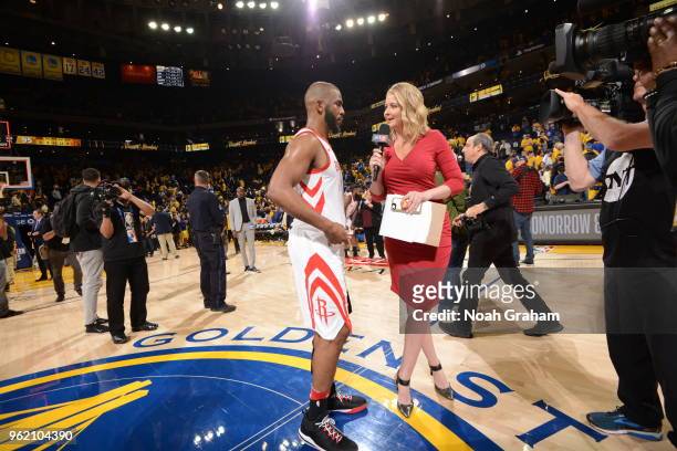 Chris Paul of the Houston Rockets talks with the media after Game Four of the Western Conference Finals of the 2018 NBA Playoffs against the Golden...
