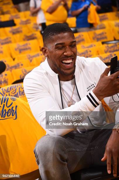 Anthony Joshua looks on in Game Four of the Western Conference Finals of the 2018 NBA Playoffs between the Houston Rockets and Golden State Warriors...