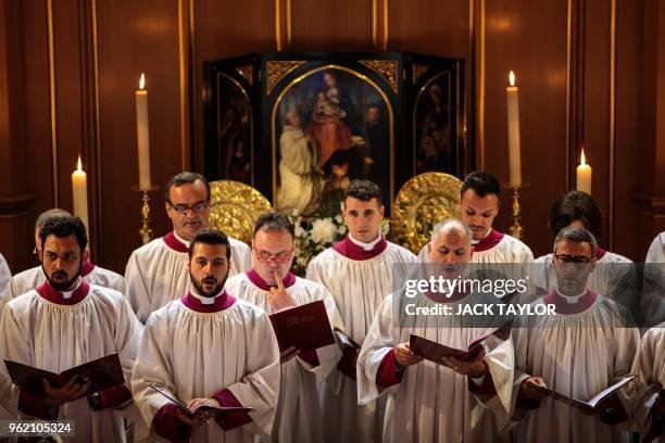 The Sistine Chapel choir perform with the Choir of Her Majesty's Chapel Royal during an Evensong service at the Chapel Royal, St James' Palace in...