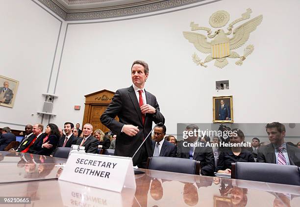 Treasury Secretary Timothy Geithner prepares to testify before a House Oversight and Government Reform Committee Hearing focusing on factors...