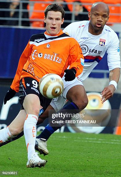 Lorient's forward Kevin Gameiro vies with Lyon's defender Jean-Alain Boumsong on January 27, 2010 during their French League Cup football match at...