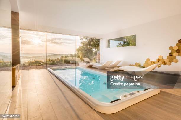 spa with whirlpool and sauna - luxury mansion interior stock pictures, royalty-free photos & images