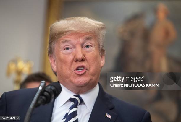 President Donald Trump speaks before signing the Economic Growth, Regulatory Relief, and Consumer Protection Act in the Roosevelt Room at the White...