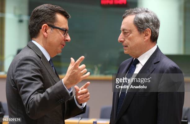 Mario Draghi , President of the European Central Bank and Spanish Finance Minister Roman Escolano attend the Eurogroup ministers' meeting in...