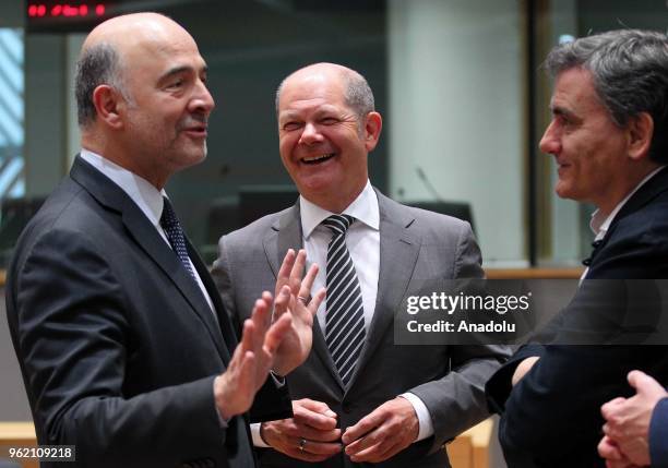 German Finance Minister Olaf Scholz , Member of the European Commission in charge of Economic and Financial Affairs, Taxation and Customs Pierre...