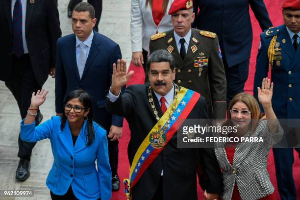 Venezuelan President Nicolas Maduro his wife Cilia Flores and Constituent Assembly president Delcy Rodriguez arrive at the Congress in Caracas for...