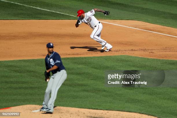 Matt Adams of the Washington Nationals attempts to steal second base as Tyson Ross of the San Diego Padres pitches during a game at Nationals Park on...