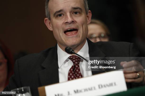 Michael Daniel, president and chief executive officer of Cyber Threat Alliance, testifies during a Senate Banking Committee hearing in Washington,...