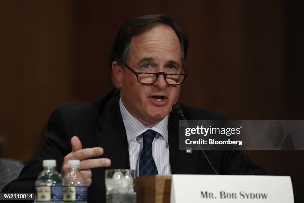 Bob Sydow, principal at Ernst and Young Capital Advisors LLC, testifies during a Senate Banking Committee hearing in Washington, D.C., U.S., on...