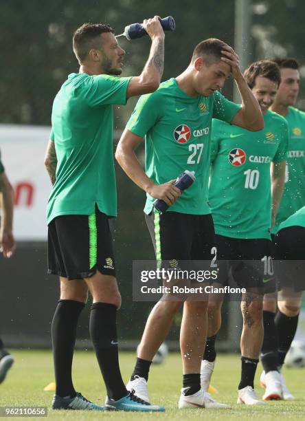 Nikita Rukavytsya and Fran Karacic of Australia take a break during the Australian Socceroos Training Session at the Gloria Football Club on May 24,...