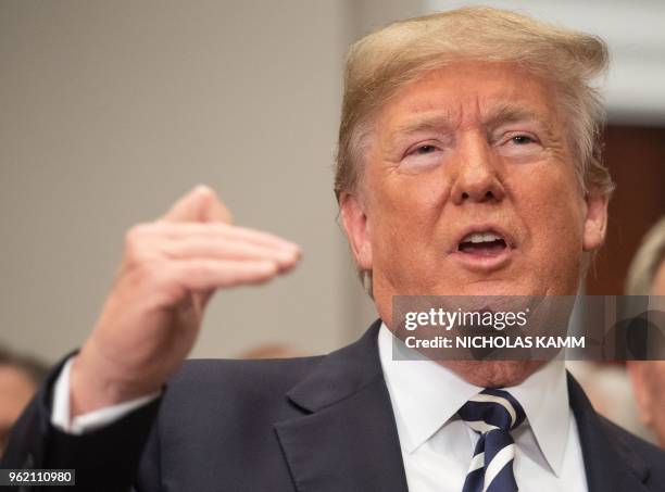 President Donald Trump speaks after signing the Economic Growth, Regulatory Relief, and Consumer Protection Act in the Roosevelt Room at the White...