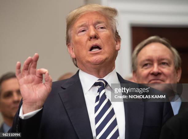President Donald Trump speaks after signing the Economic Growth, Regulatory Relief, and Consumer Protection Act in the Roosevelt Room at the White...