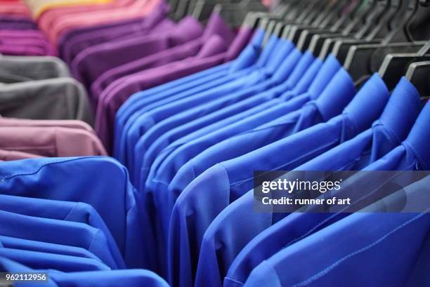 colourful baju melayu for hari raya on sale - baju melayu stock pictures, royalty-free photos & images