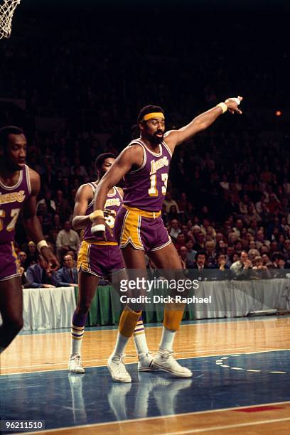 Wilt Chamberlain of the Los Angeles Lakers defends against the Boston Celtics during a game played in 1973 at the Boston Garden in Boston,...