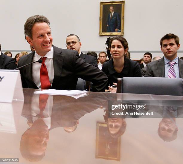 Treasury Secretary Timothy Geithner prepares to testify before a House Oversight and Government Reform Committee Hearing focusing on factors...