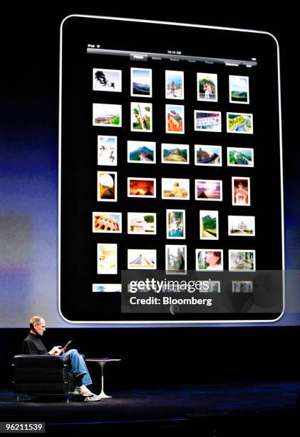 Steve Jobs, chief executive officer of Apple Inc., demonstrates the Apple iPad tablet during its debut at the Yerba Buena Center for the Arts Theater...