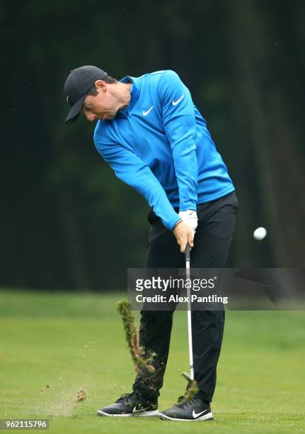 Rory McIlroy of Northern Ireland plays his second shot on the 14th during day one of the 2018 BMW PGA Championship at Wentworth on May 24, 2018 in...