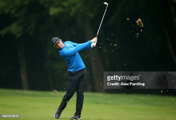 Rory McIlroy of Northern Ireland plays his second shot on the 14th during day one of the 2018 BMW PGA Championship at Wentworth on May 24, 2018 in...