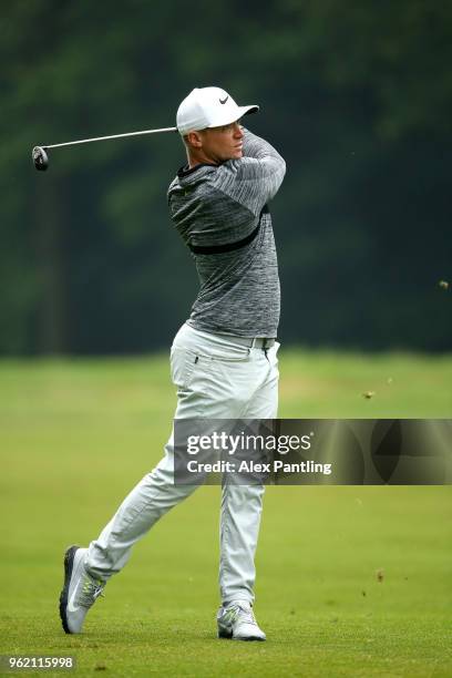 Alex Noren of Sweden reacts to a shot during day one of the 2018 BMW PGA Championship at Wentworth on May 24, 2018 in Virginia Water, England.